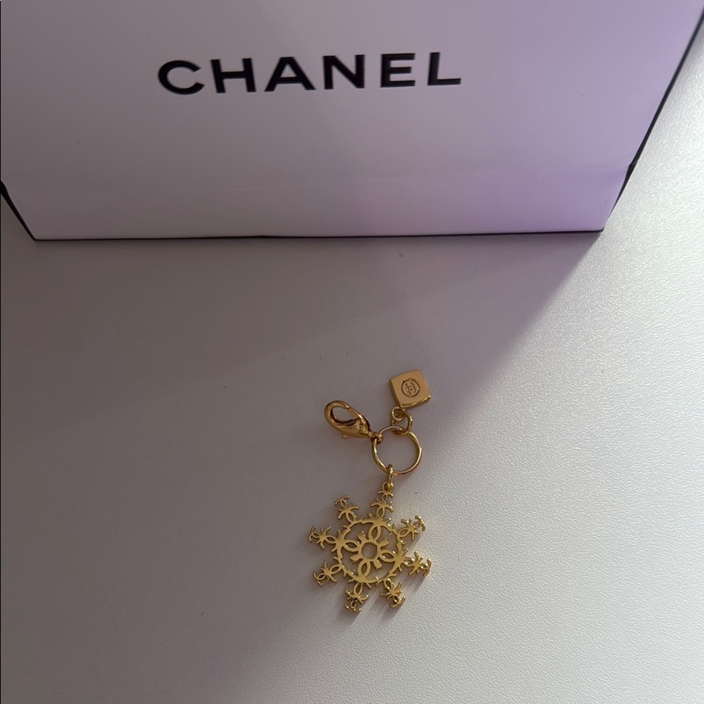 CHANEL Gold Snowflake Charm